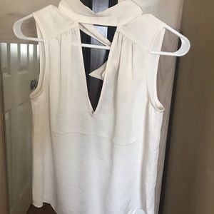 Ivory sleeveless blouse